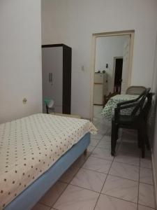 Cama ou camas em um quarto em Roxsha Apartments
