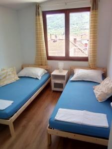 Posteľ alebo postele v izbe v ubytovaní Relax Garden