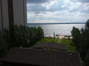 a view of a large body of water from a building at Flory`s Apartment Mamaia in Mamaia