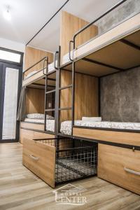 Postel nebo postele na pokoji v ubytování Hostel Center