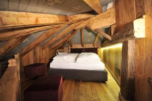 Postel nebo postele na pokoji v ubytování Locanda dei gentili