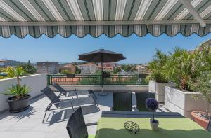 Balkón alebo terasa v ubytovaní Modern Apartman Pjero