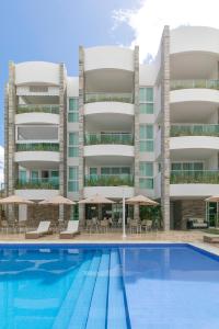 Bazén v ubytování Wave Suítes Hotel & Lounge bar nebo v jeho okolí