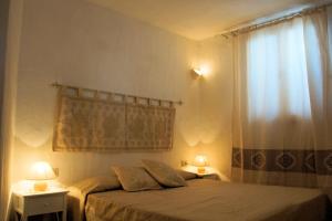 Postelja oz. postelje v sobi nastanitve Valledoria holiday flats