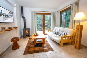 Posezení v ubytování Cabañas Villa Sequoia