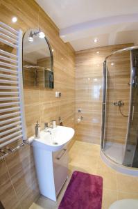Kúpeľňa v ubytovaní Apartamenty Giżycko