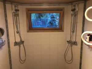Kylpyhuone majoituspaikassa Jokiranta