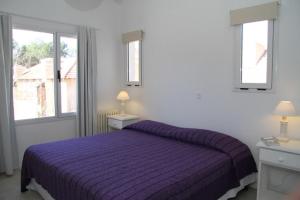 เตียงในห้องที่ Complejo Tridente +11 ภาพ