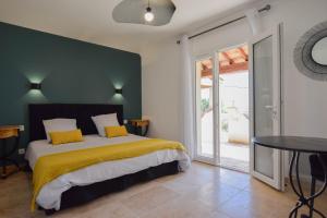 Postel nebo postele na pokoji v ubytování Le Clos en Provence