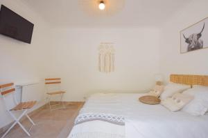 Postel nebo postele na pokoji v ubytování Le Clos en Provence