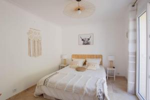 Postel nebo postele na pokoji v ubytování Le Clos en Provence