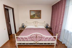 Un pat sau paturi într-o cameră la Columba Livia Guesthouse