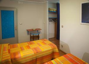 Postel nebo postele na pokoji v ubytování LOU LOOP B&B