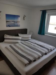 Postel nebo postele na pokoji v ubytování Appartement Haus Pichler