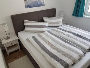 Postel nebo postele na pokoji v ubytování Appartement Haus Pichler