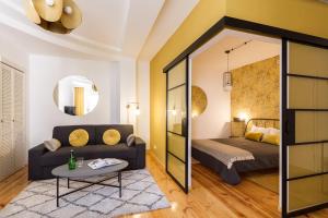 Łóżko lub łóżka w pokoju w obiekcie House Apartments Centrum Poznań