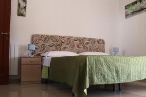 Postel nebo postele na pokoji v ubytování B&B Bellavista Francofonte