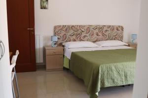 Postel nebo postele na pokoji v ubytování B&B Bellavista Francofonte