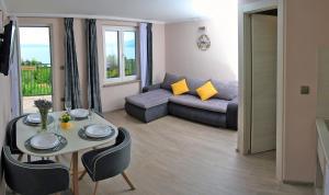 Posedenie v ubytovaní Apartmani Donata