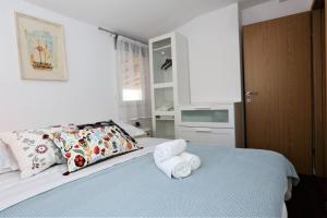 Posteľ alebo postele v izbe v ubytovaní RELAX HOUSE
