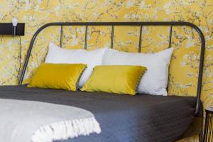 Łóżko lub łóżka w pokoju w obiekcie House Apartments Centrum Poznań
