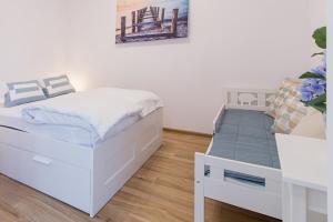 Posteľ alebo postele v izbe v ubytovaní Praia Apartments - 200m do Plaży Orłowo - Parking - Apartament Laguna
