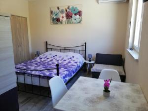 Voodi või voodid majutusasutuse Studio Apartment Palmira toas