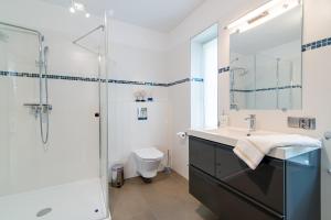 Kúpeľňa v ubytovaní Praia Apartments - 200m do Plaży Orłowo - Parking - Apartament Laguna