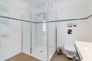 Kúpeľňa v ubytovaní Praia Apartments - 200m do Plaży Orłowo - Parking - Apartament Laguna + 37 fotografií