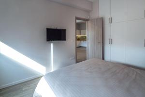 A bed or beds in a room at THE apartment 2 BDRS/2 BATHS luxury residence