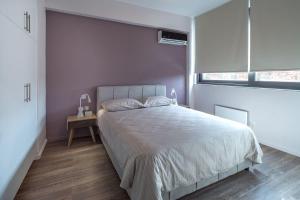 A bed or beds in a room at THE apartment 2 BDRS/2 BATHS luxury residence