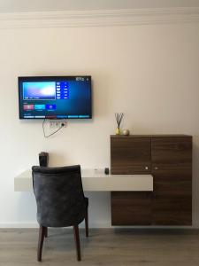 TV a/nebo společenská místnost v ubytování Hotel Dardani
