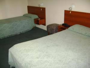 Ένα ή περισσότερα κρεβάτια σε δωμάτιο στο Real Splendid Hotel +33 φωτογραφίες