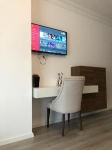 TV a/nebo společenská místnost v ubytování Hotel Dardani