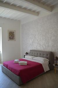 Postel nebo postele na pokoji v ubytování Allegra Toscana - Affittacamere Guest house Arezzo