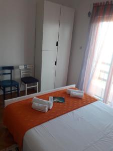 Postel nebo postele na pokoji v ubytování Apartments Pag Holiday