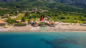 an aerial view of a resort on a beach at Hotel Savojo in Petrovac na Moru