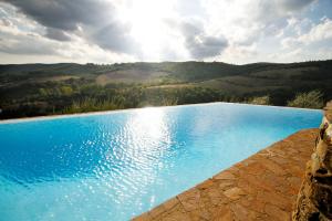 The swimming pool at or close to Capannelle Wine Resort