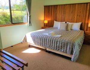 Tempat tidur dalam kamar di Broken River Mountain Resort