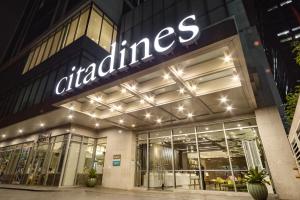 a store front of a chatelaine building at night at Citadines Millennium Ortigas Manila in Manila