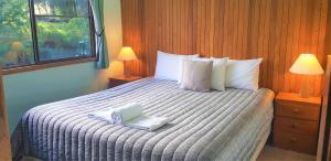 Tempat tidur dalam kamar di Broken River Mountain Resort