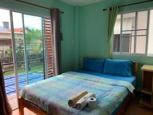 מיטה או מיטות בחדר ב-You&Me Hostel