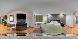 Studio 6 Lake Charles客房内的一张或多张床位