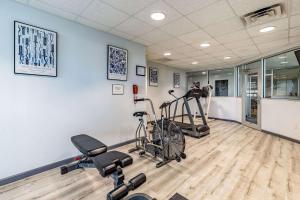 a gym with bikes and exercise equipment in a room at Quality Inn Branson - Hwy 76 Central in Branson