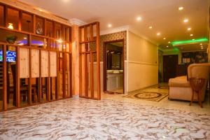 Kuchyň nebo kuchyňský kout v ubytování Galaxy Grand Hotel