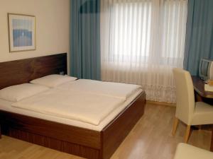 Letto o letti in una camera di Winzerhof Michael Gartner