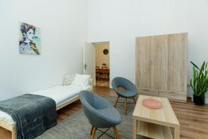 Postel nebo postele na pokoji v ubytování SOPHIE Apartman