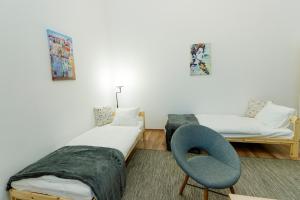 Postel nebo postele na pokoji v ubytování SOPHIE Apartman