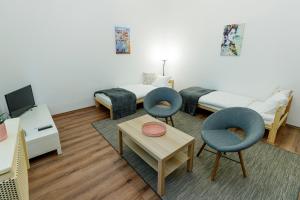 TV a/nebo společenská místnost v ubytování SOPHIE Apartman