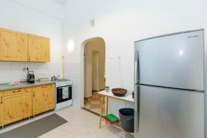 Kuchyň nebo kuchyňský kout v ubytování SOPHIE Apartman